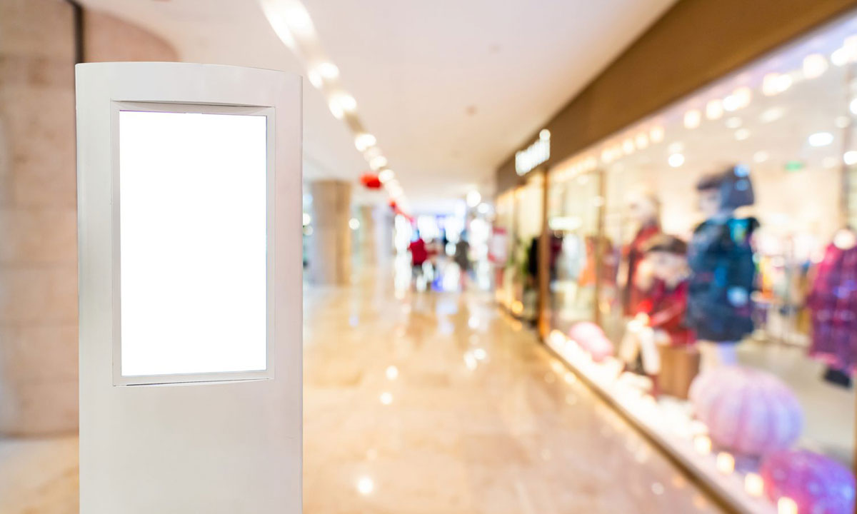 Lit signboard inside a shopping centre hallway | Dawson Electric